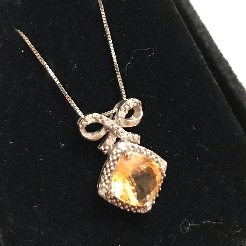 Cushion cut citrine and diamond bow pendant, 18” length